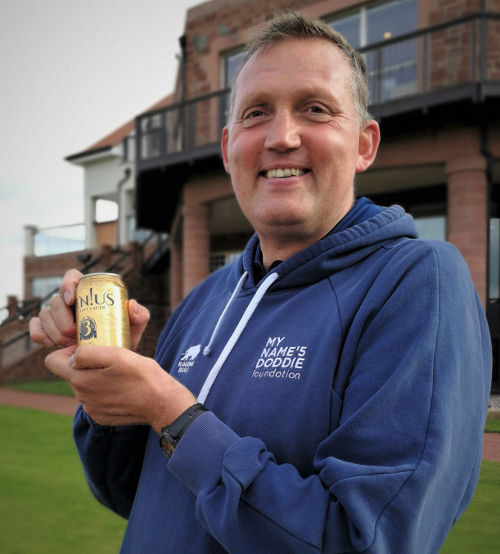 Doddie Weir with Gen!us Craft Lager Doddie Weir